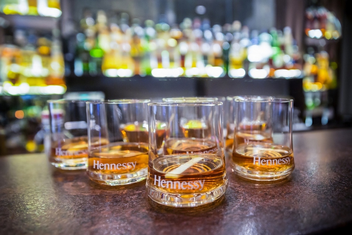 Whisky poured into house tumblers at The Oak Lounge bar