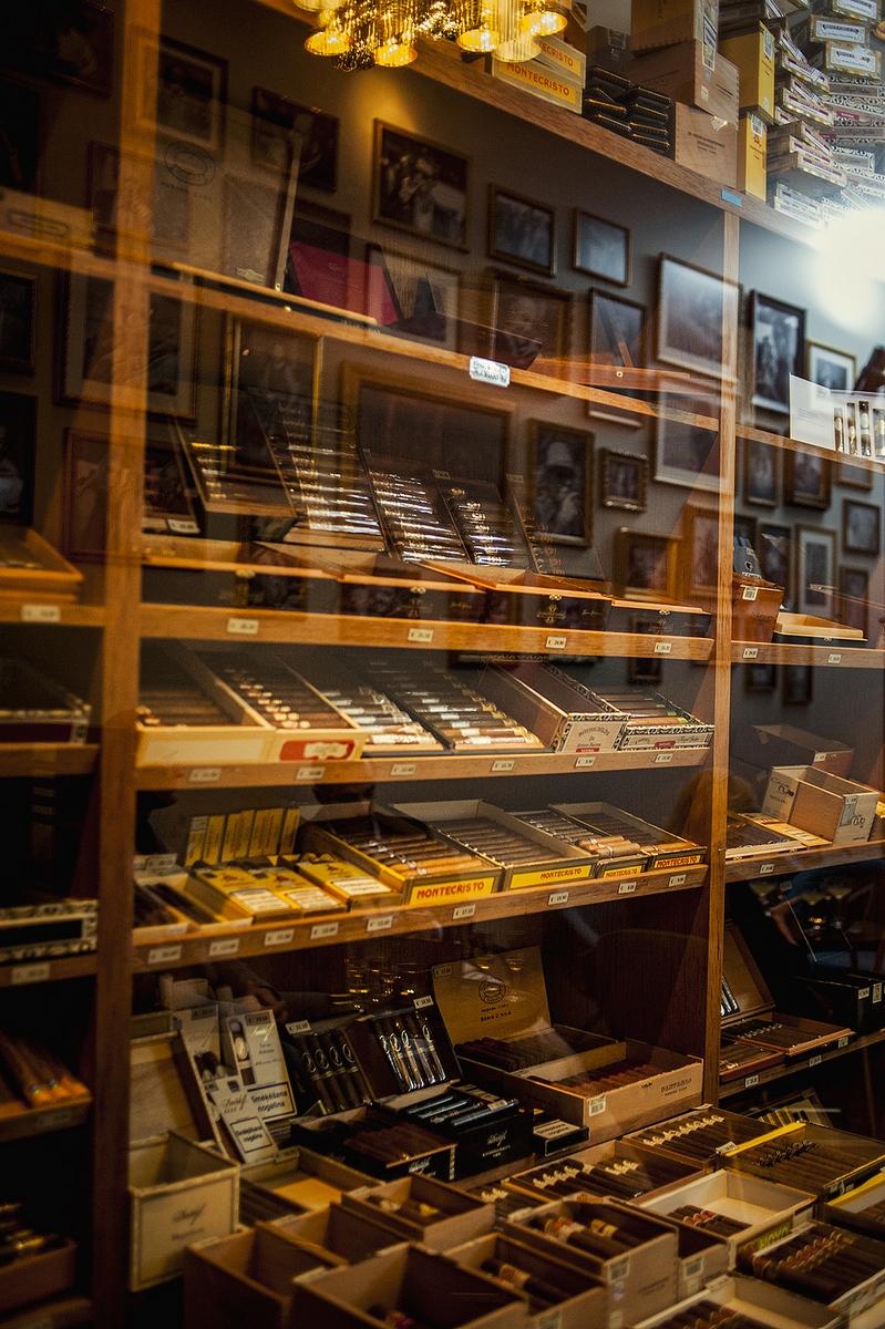 Shelves of cigar boxes inside the walk-in humidor