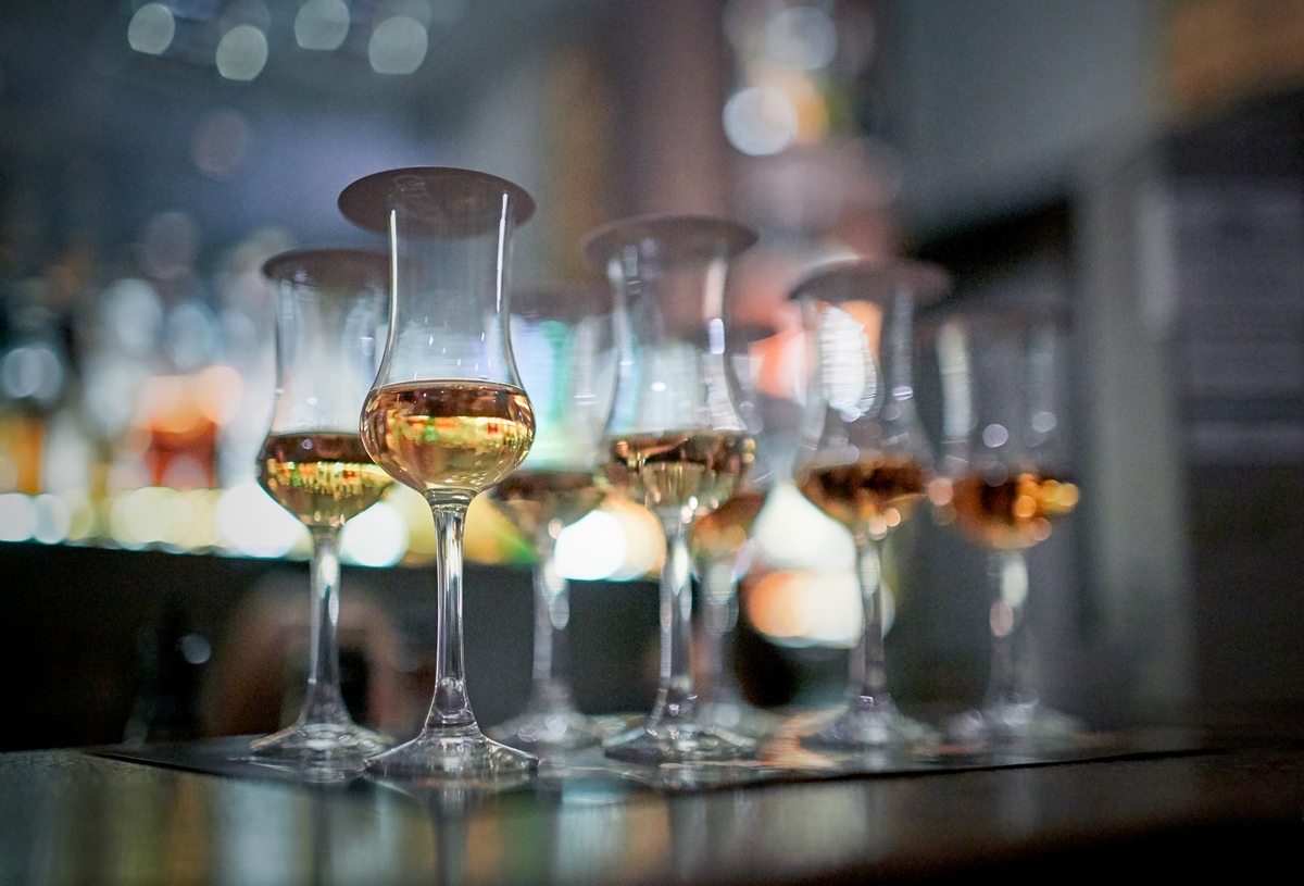 Nosing glasses set out along the bar at The Oak Lounge